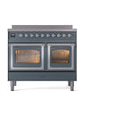 Freestanding induction range in blue-gray with two glass oven doors and chrome trim