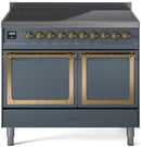 Blue-grey induction range with brass-trimmed double oven doors and front control knobs