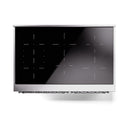 Black glass induction cooktop with marked burner zones, glossy surface