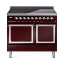 Burgundy double oven range with two closed doors and black cooktop controls