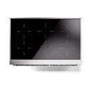 Emerald green glass oven door panel with touch markings and vent-like lines