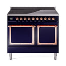 Midnight blue induction range with two oven windows, copper-trim control knobs