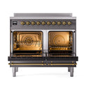 Nostalgie induction range with two open ovens, brass knobs and matte graphite finish