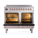 Stainless steel induction range with open double ovens and copper-trim door, racks visible