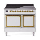 White induction range with brass-trimmed oven doors and front control knobs