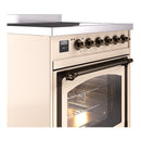 ILVE induction range control panel with bronze knobs and lit oven door opening