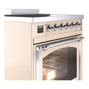 Antique white induction range front with chrome knobs and oven door handle