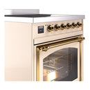 Antique white induction range with brass-trim controls and open oven door