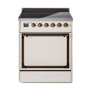 Antique white range front with bronze knobs and closed oven door