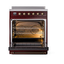 Open oven of a burgundy induction range with racks and bronze-trimmed frame