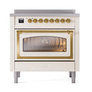 Antique white oven with brass-trimmed glass door and front control display