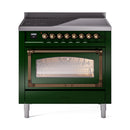 Emerald green induction range with bronze knobs and lit oven window, front three-quarter view