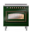 Front view of emerald green induction range with bronze knobs and illuminated oven interior