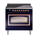 Midnight blue induction range with open oven door and copper bar handle detail