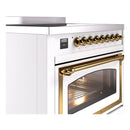 Induction range front with brass handle, glass oven door, and control panel