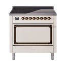 Antique white induction range with closed oven door and bronze control trim