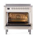 Antique white induction range with chrome-trim oven door open and broiler rack inside