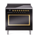 36-inch induction range with glossy black oven door and brass trim, front view