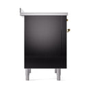Glossy black range cabinet with brass handle knobs and silver feet, angled side view