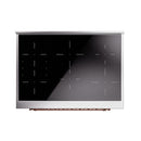 Emerald green induction cooktop with stainless edge and black glass display panel