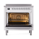 ILVE 36-inch induction range with open oven door, chrome handle, visible interior