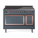 Blue-grey induction range with open dual ovens, copper door frames, and knob panel