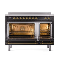 Glossy black induction range oven with dual open brass-trimmed doors