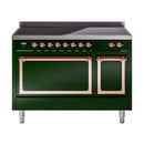 Emerald green induction range with copper-trim control knobs and two closed oven doors