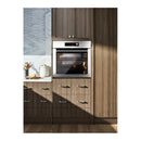 Stainless steel built-in single wall oven installed in modern kitchen cabinetry