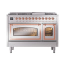 Stainless steel dual oven range with copper-trimmed glass doors and lit oven interiors