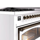 White range control panel with bronze knobs and digital clock display