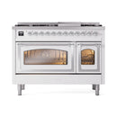 White dual-fuel freestanding gas range with illuminated oven windows and chrome knobs