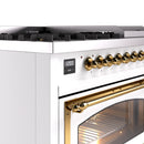 White control panel with brass knobs and digital clock display
