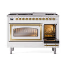 White range with left oven open, brass-trim doors, and interior visible