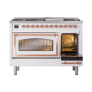White range with left oven open, right oven closed, and copper trim handles