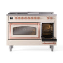 Antique white dual fuel range with right oven door open, copper trim front view