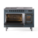 Blue-grey range with left oven open and right glass door open, racks and burner glow visible
