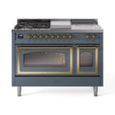 Dual fuel gas range with blue gray body, brass knobs, and glass oven doors