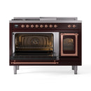 Burgundy dual-fuel range with both ovens open, copper interior trim and controls