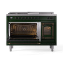 Emerald green dual fuel range with bronze trim, both ovens open showing racks and burners