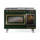 Emerald green range with one oven door open, interior light, and brass trim