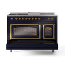 Midnight blue gas range with brass-trimmed double oven doors and side vent panel