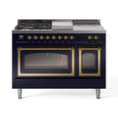 Midnight blue dual-fuel range with brass-trim frames and closed oven doors