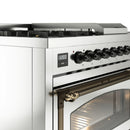 Stainless dual fuel range control panel with display, burner knobs, and bronze oven handle
