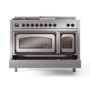 Stainless steel dual-fuel range with front ovens closed, control knobs and display