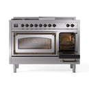 Stainless dual fuel range with bronze trim, left oven door open and right oven door closed