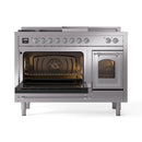 Stainless steel dual fuel range with left oven door open and right door closed