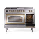 Dual fuel range with open right oven door, brass handle, and visible oven racks