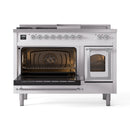White dual fuel range with both oven doors open, chrome hinges and lit interiors