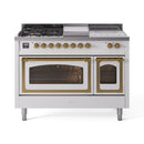 White dual-fuel range with brass trim, five burner cooktop and two oven doors